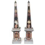 Pair of Grand Tour style floor standing white marble and hardstone obelisks on square stands, each