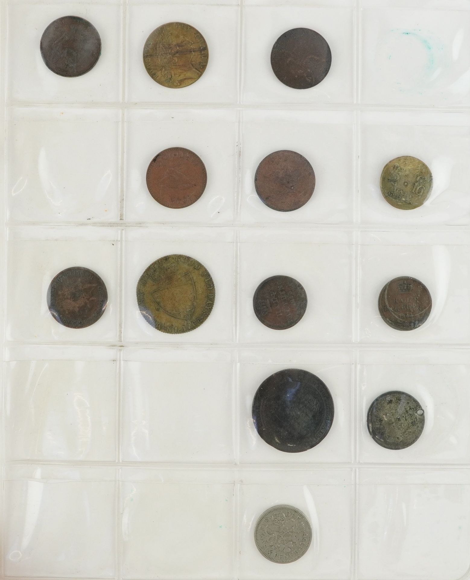 George III and later coinage and tokens arranged in an album including Duke of Wellington 1812