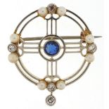 Art Deco unmarked two tone gold brooch set with five diamonds, sapphire and six seed pearls, the