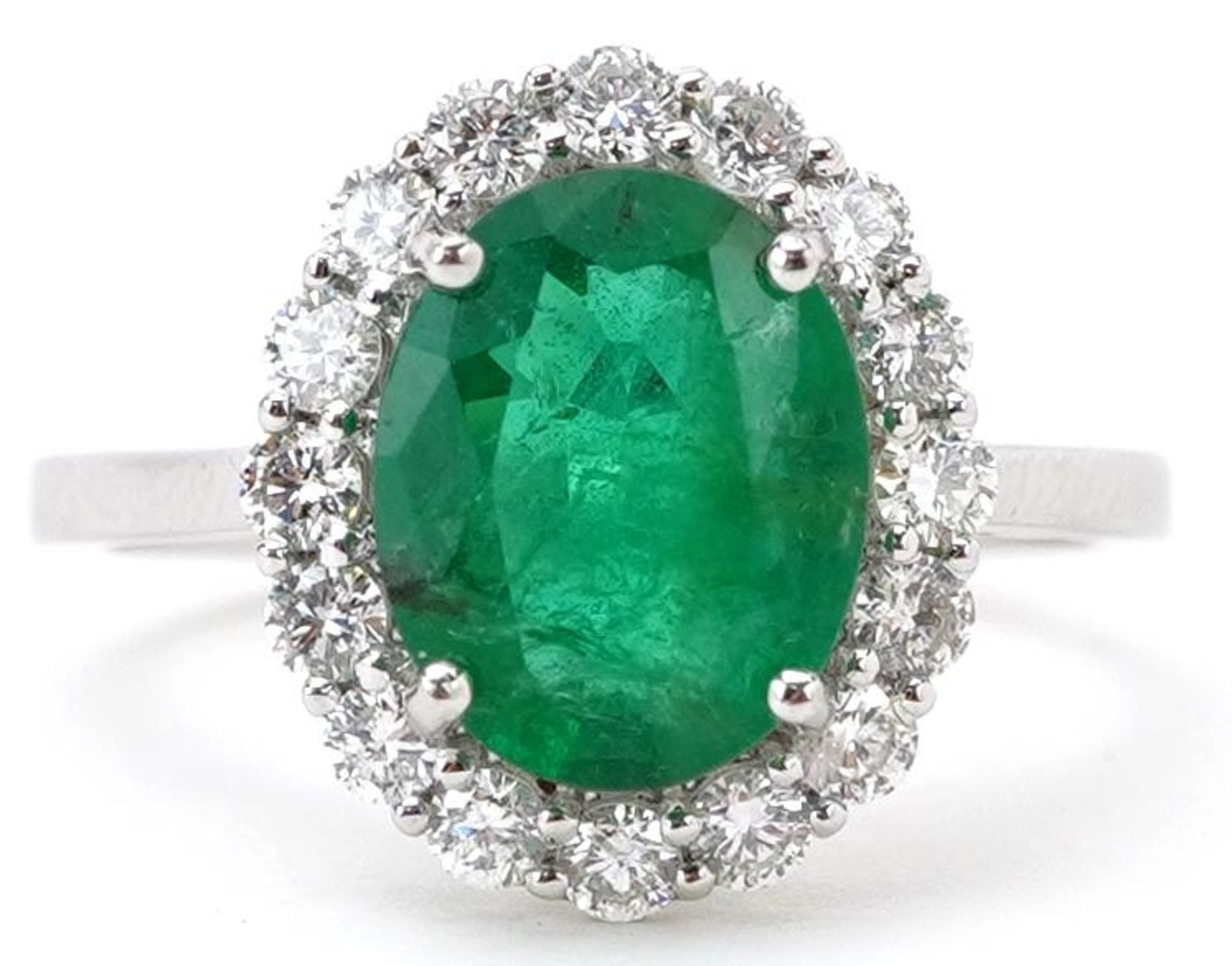 18ct white gold emerald and diamond cluster ring with certificate, total diamond weight