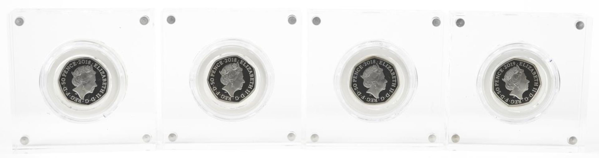 Four Paddington Bear silver proof fifty pence pieces by The Royal Mint, housed in Perspex slabs with - Image 3 of 3
