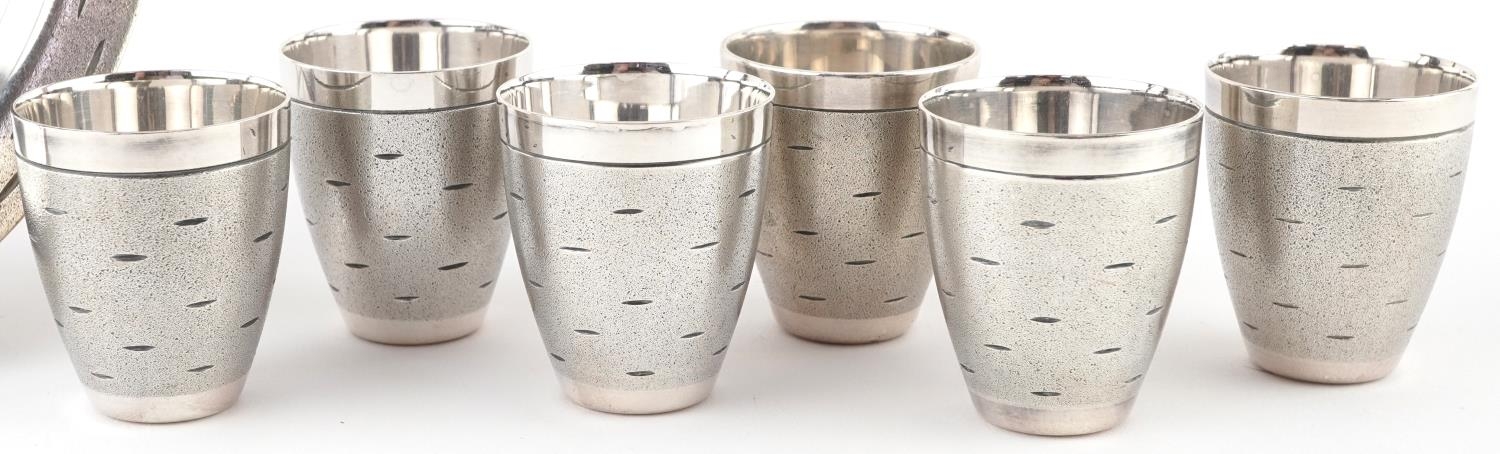 Set of six Modernist chrome shot glasses on circular tray, largest 16cm in diameter - Image 3 of 6