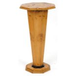 Art Deco style octagonal bird's eye maple effect pedestal with tapering column, 78.5cm high