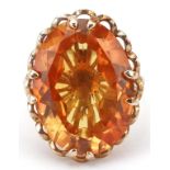 Large 9ct gold orange sapphire ring, the sapphire approximately 20.70mm x 15.40mm x 6.20mm deep,