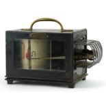 Negretti & Zambra barograph housed in a metal case with glass panel, 25.5cm wide