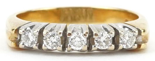18ct gold diamond five stone ring, total diamond weight approximately 0.31 carat, size M, 4.8g