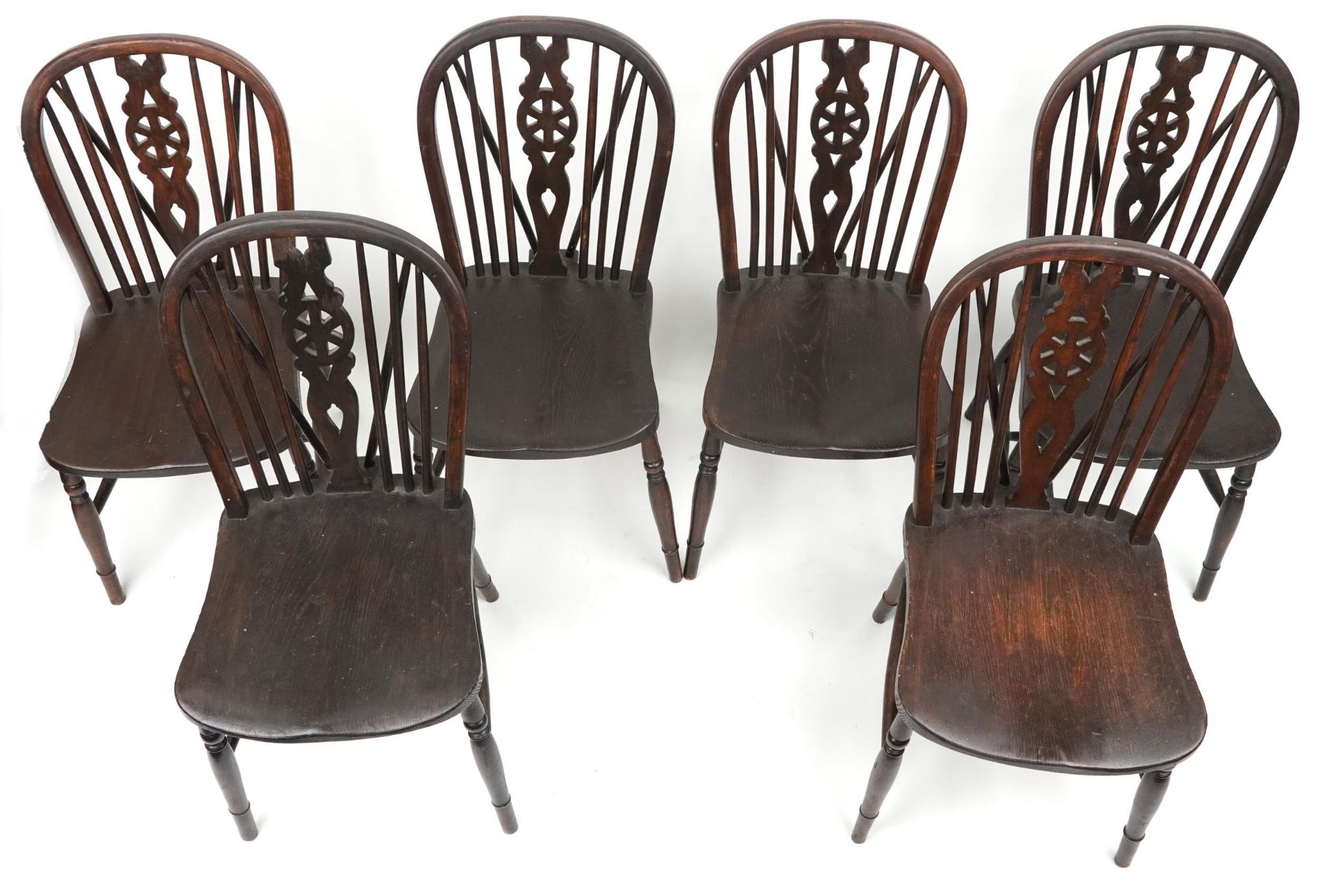 Set of eight antique oak wheel back dining chairs together with two oak wheel back carver chairs, - Image 3 of 9