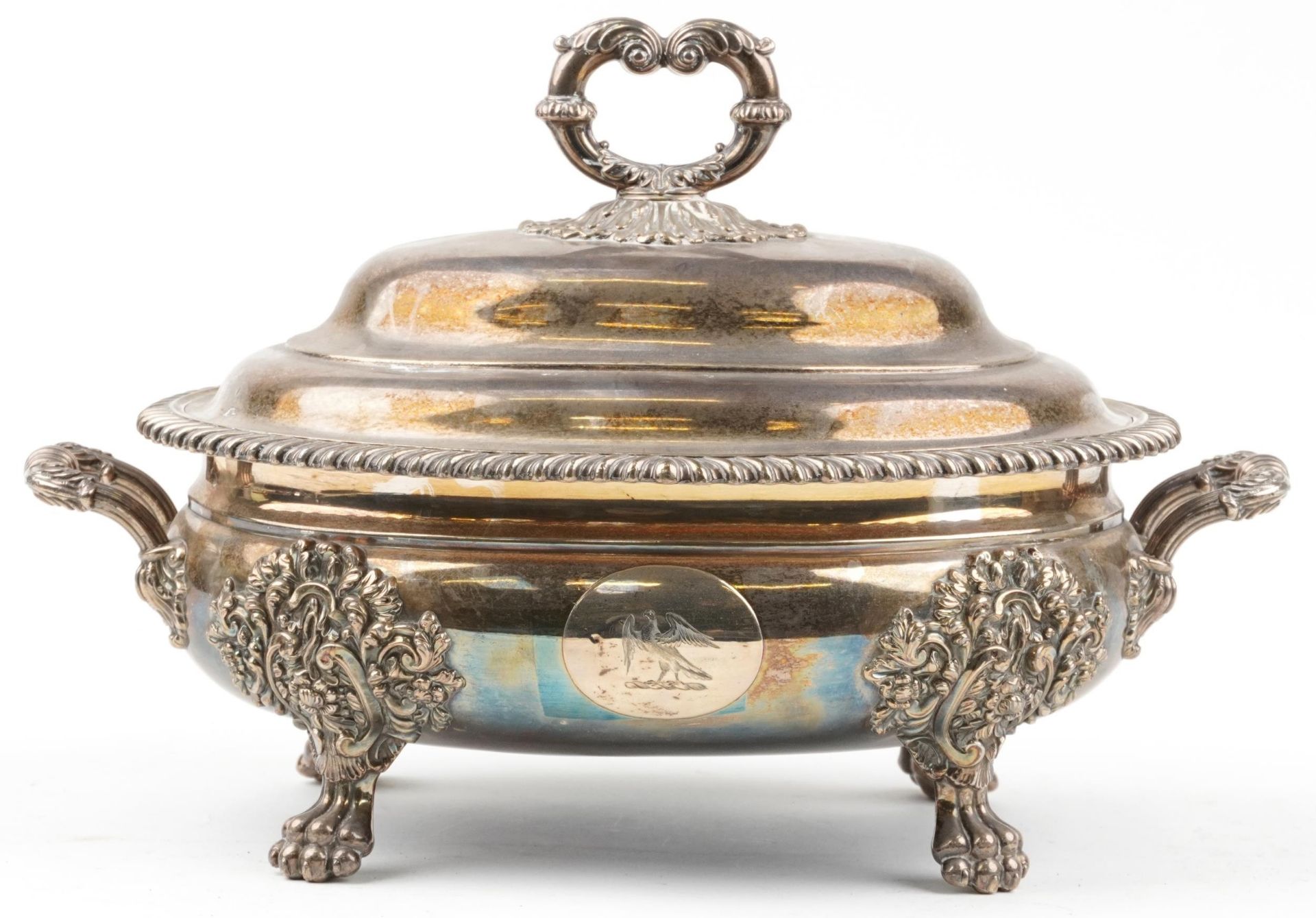 Good quality Victorian silver plated soup tureen and cover with twin handles on lion paw feet,