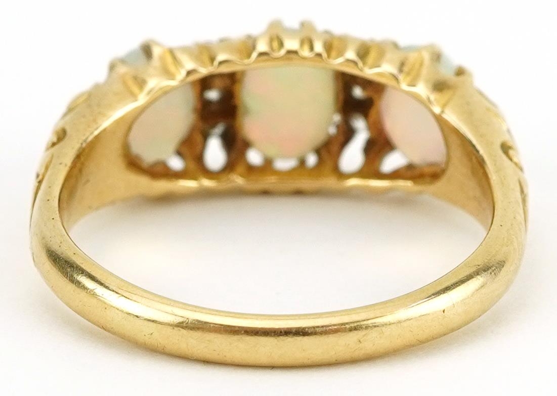 Edwardian 18ct gold cabochon opal and diamond ring with ornate pierced setting, set with three opals - Image 3 of 5