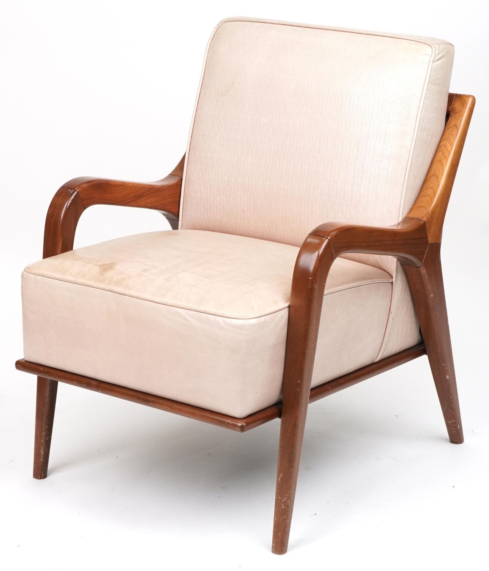 Scandinavian design hardwood lounge chair having a cream upholstered back and seat, 86cm H x 62.
