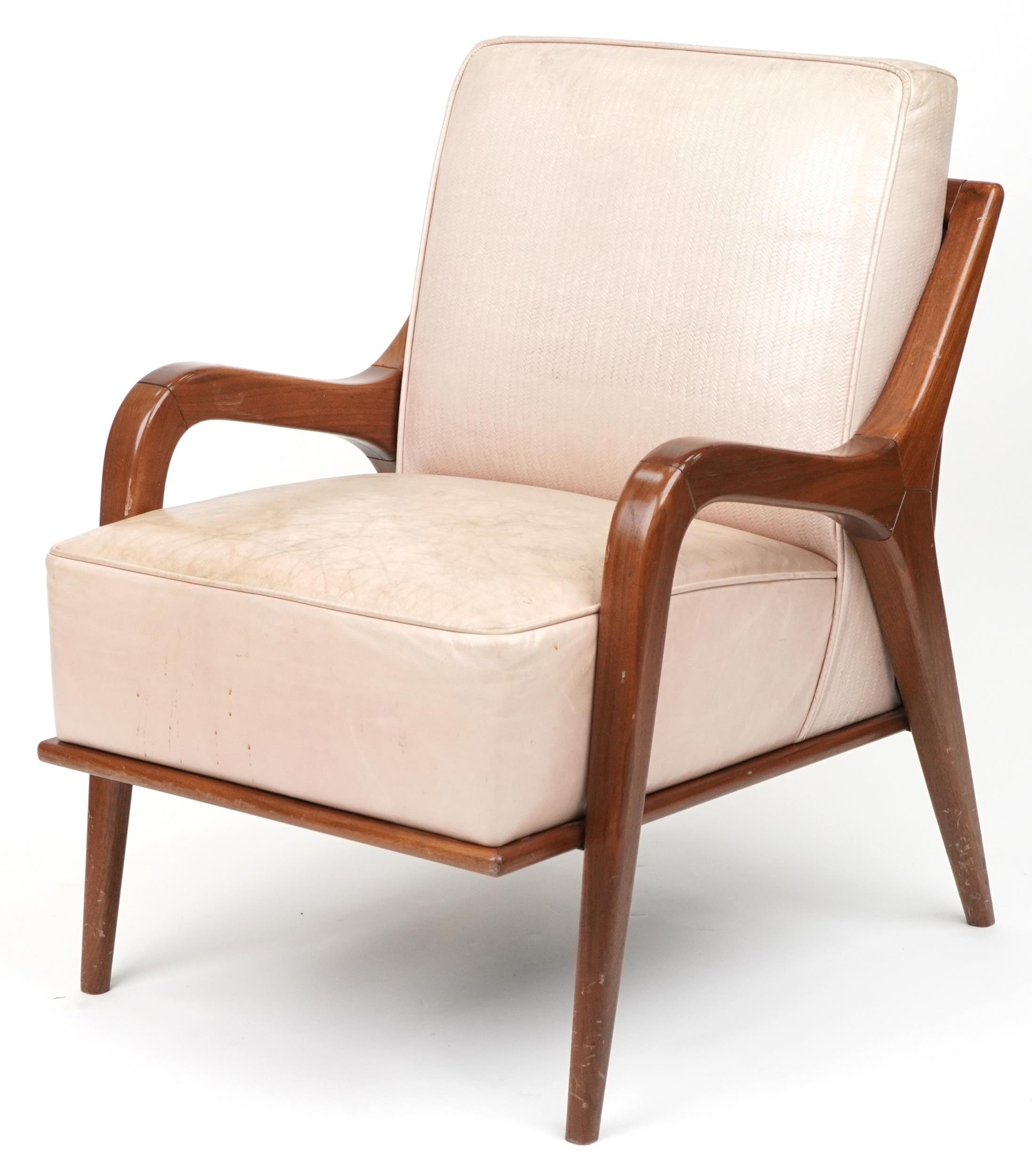 Scandinavian design hardwood lounge chair having a cream upholstered back and seat, 86cm H x 62.