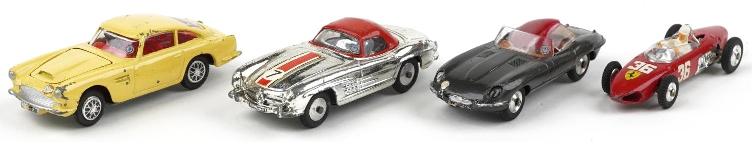 Four vintage Corgi Toys diecast vehicles with boxes comprising Aston Martin DB4 218, E Type Jaguar - Image 2 of 5
