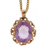 Modernist 9ct gold amethyst pendant with pierced flower head setting on a gold plated necklace, 2.