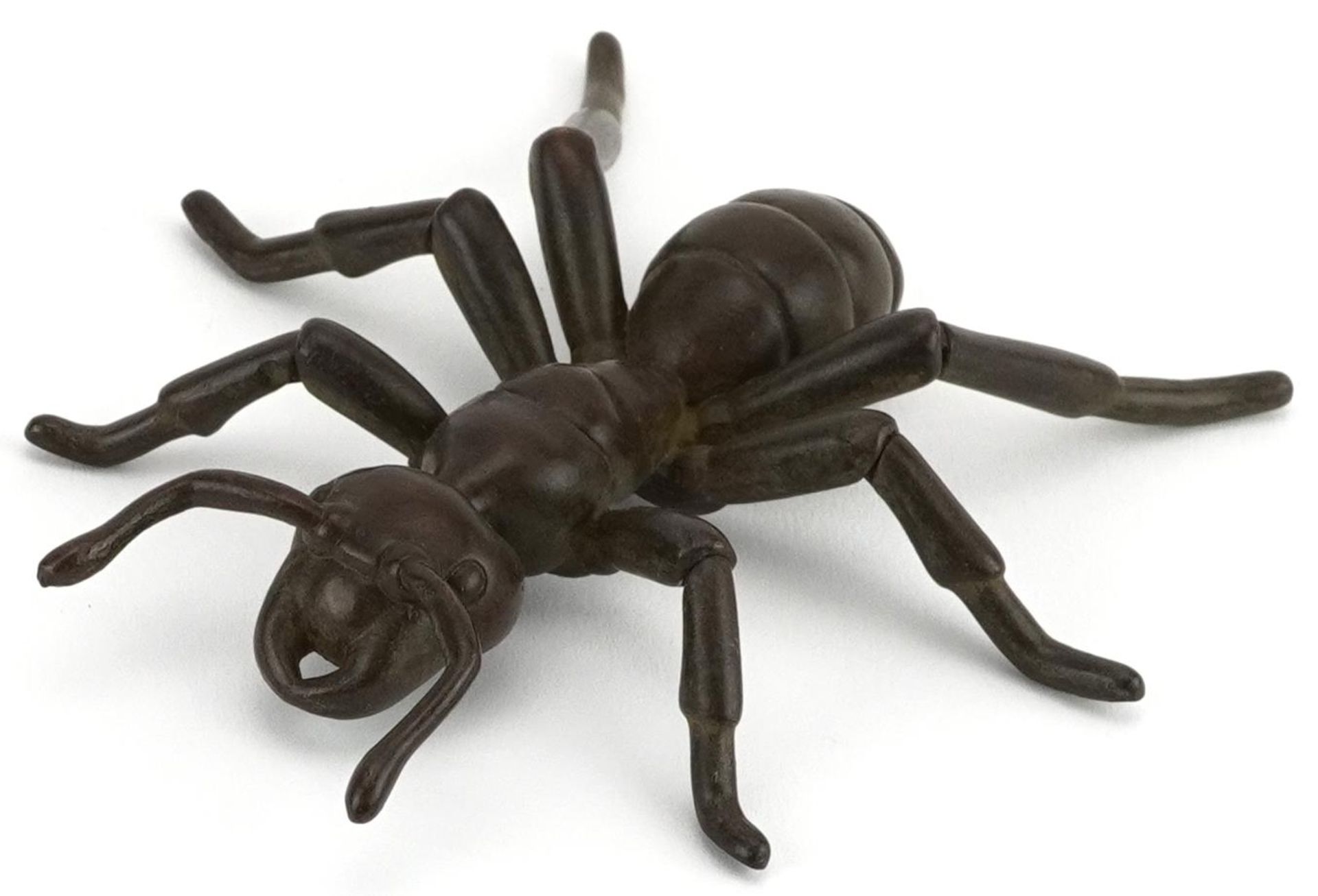 Large Japanese patinated bronze okimono in the form of an ant with articulated legs, impressed