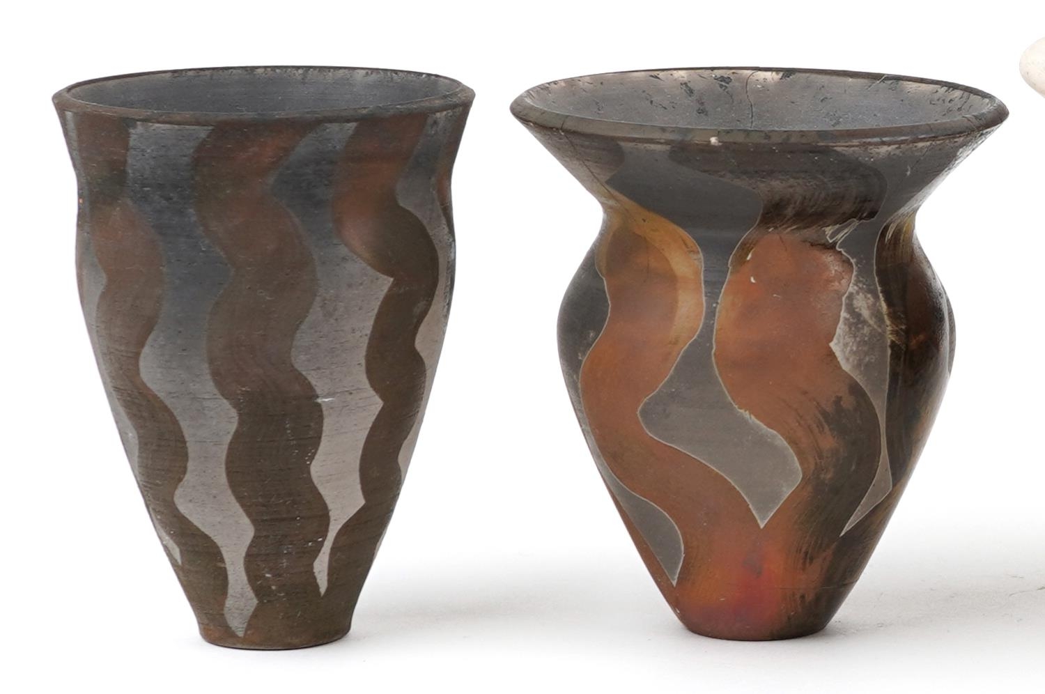 Contemporary raku glazed studio pottery including a centre bowl and two vases having an abstract - Image 2 of 7
