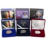 Three Queen Elizabeth II and The Queen Mother commemorative silver crowns by The Royal Mint, with