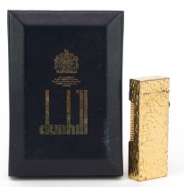 Dunhill gold plated bark design pocket lighter with box, 6.5cm high