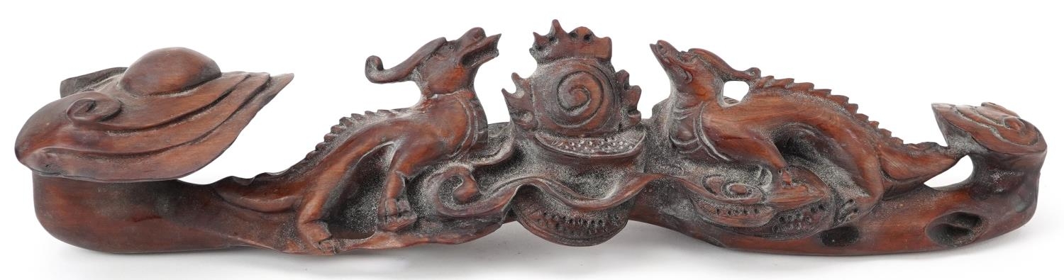 Chinese hardwood ruyi sceptre carved with two dragons chasing the flaming pearl, 43cm wide - Image 2 of 8