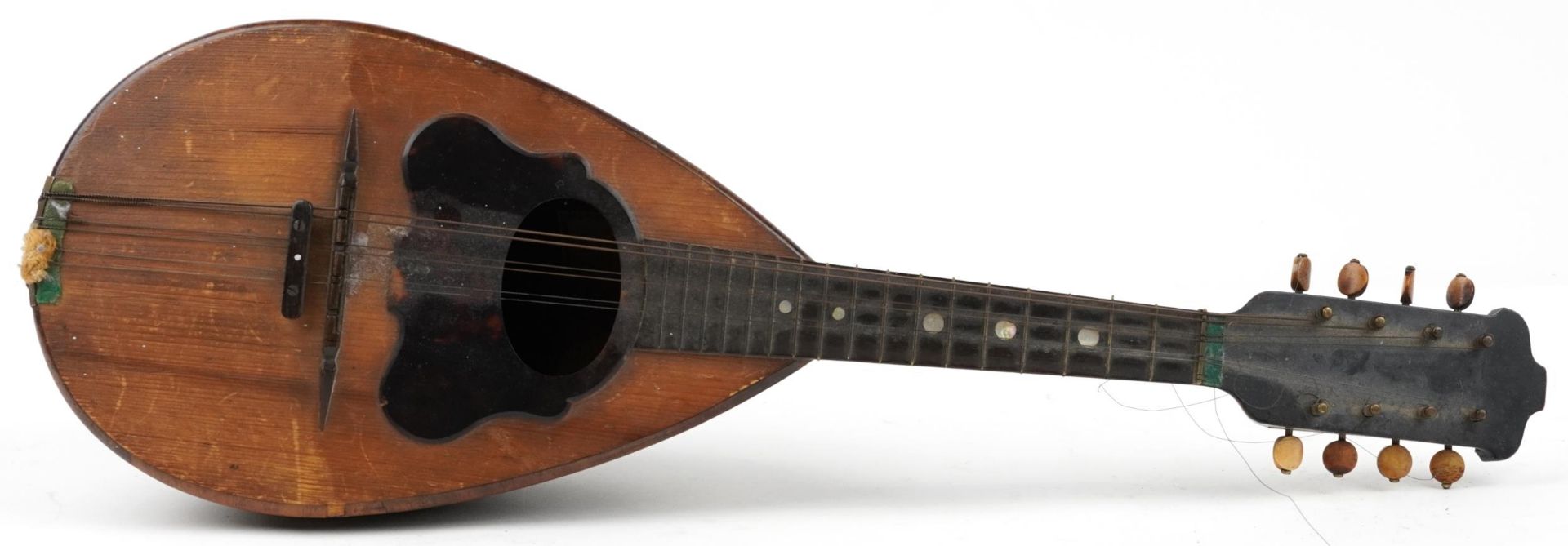 19th century Italian melon shaped rosewood mandolin bearing an L Romito & F Carbone paper label,