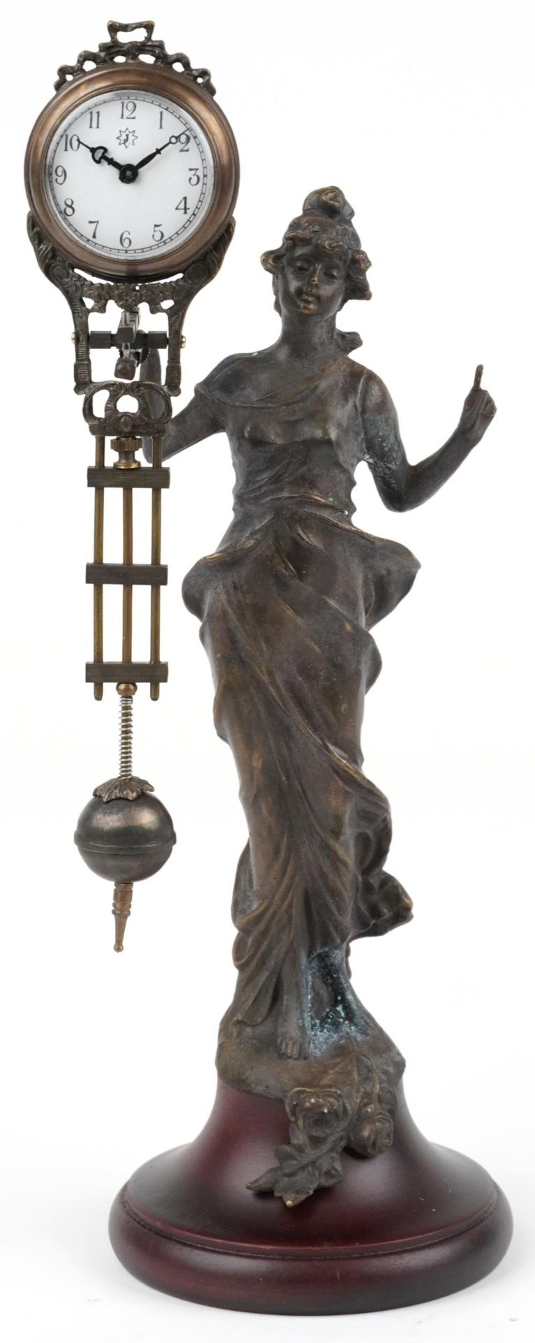 Patinated spelter mystery clock in the form of an Art Nouveau maiden, 33.5cm high