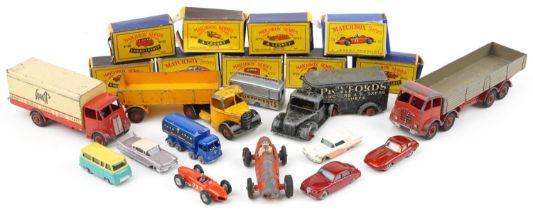 Vintage diecast vehicles, some with boxes, including Matchbox Series, Timpo Toys, Dinky Supertoys