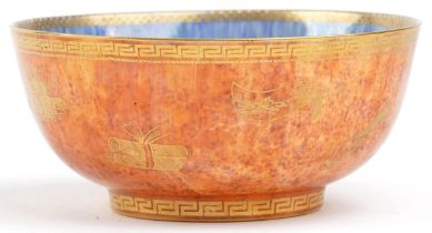 Wedgwood orange and blue ground Fairyland lustre bowl gilded with dragons chasing the flaming