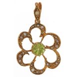 Edwardian 15ct gold seed pearl and green stone open work flower head pendant, possibly peridot, 2.