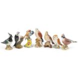 Seven Beswick birds including Jay, Lapwing and Lesser Spotted Woodpecker, the largest 17cm high
