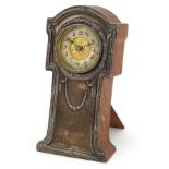 Art Nouveau silver mounted oak strut clock in the form of a longcase clock having enamelled dial