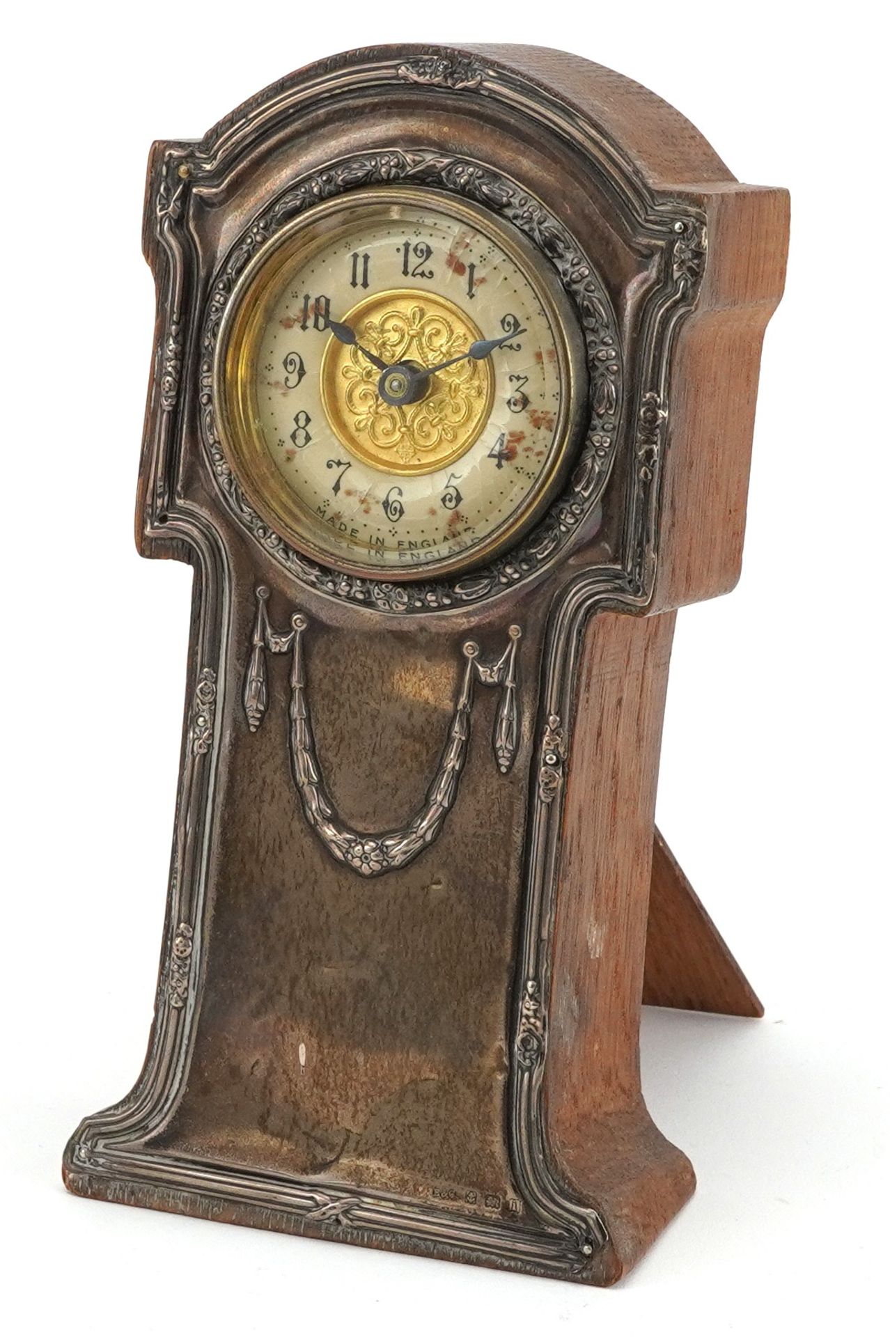 Art Nouveau silver mounted oak strut clock in the form of a longcase clock having enamelled dial
