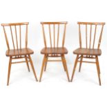 Ercol, three mid century light elm 391 chairs