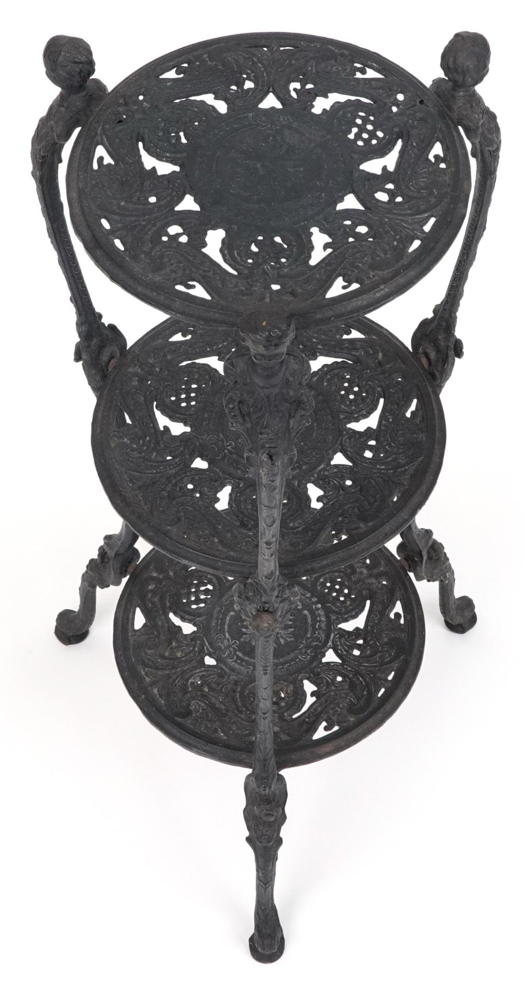 Victorian style cast iron three tier plant stand with figural mounts, 74cm high - Image 2 of 3