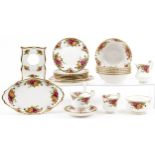 Royal Albert Old Country Roses teaware and a clock case, the largest 24.5cm wide