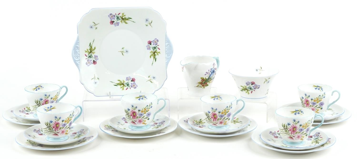 Shelley Wild Flowers six place tea service comprising six trios, milk jug, sugar bowl and sandwich