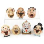 Seven early 20th century smoking interest Japanese porcelain ashtrays in the form of comical