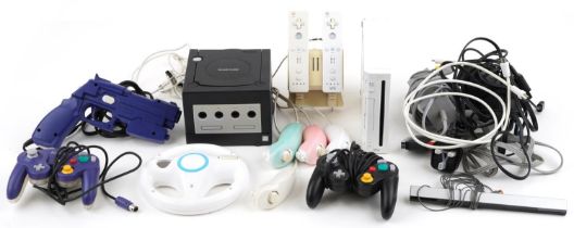 Nintendo Wii games console with controllers and accessories and a Nintendo Game Cube games console