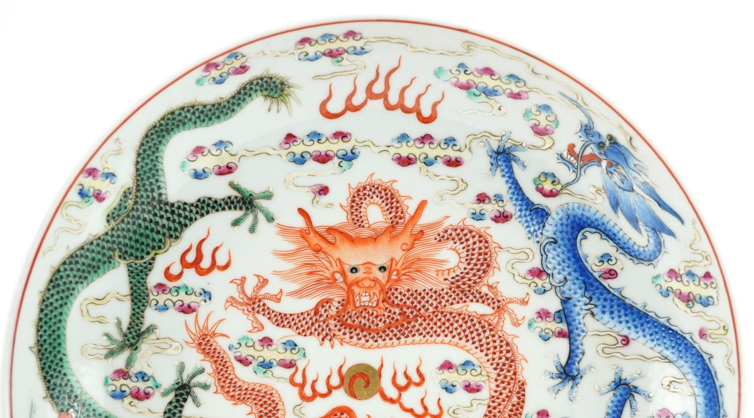 Chinese porcelain shallow dish hand painted in the famille rose palette with dragons chasing the - Image 2 of 4