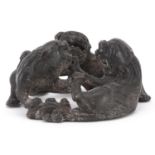 Chinese patinated bronze of three mythical animals, 6cm in diameter