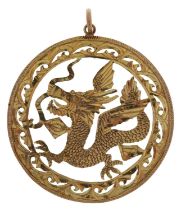 Chinese 14K gold pierced pendant in the form of a dragon, 4.5cm in diameter, 6.2g