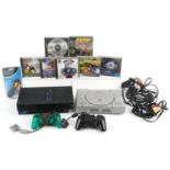 Sony PlayStation 2 games console with controller and a Sony PlayStation 1 games console with