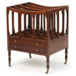 George III style mahogany Canterbury with base drawer on turned legs with brass casters, 59cm H x