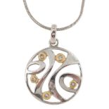 Modernist 14ct white gold diamond pendant on a 14ct white gold necklace, total diamond weight