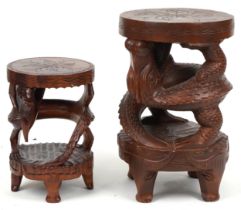 Two Chinese carved hardwood dragon design occasional tables, the largest 62cm high x 39cm in