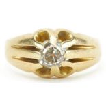 18ct gold diamond solitaire ring with pierced setting, the diamond approximately 0.70 carat, size M,