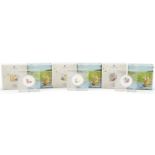 Three Winnie the Pooh silver proof fifty pence pieces by The Royal Mint, housed in Perspex slabs