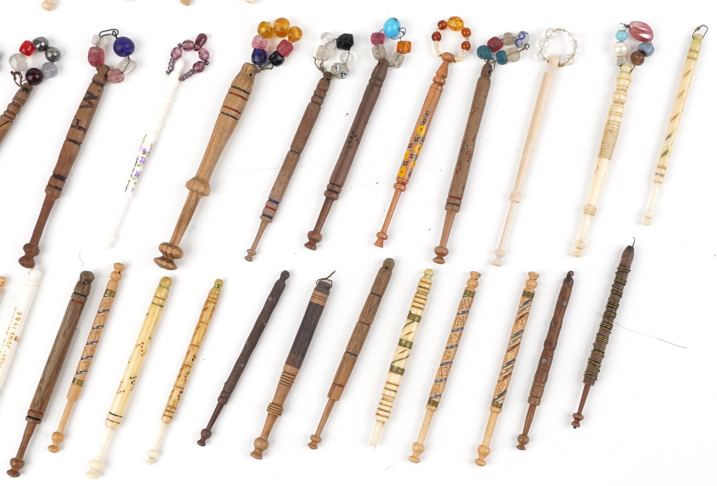 Collection of sewing interest carved bone and hardwood lace making bobbins with beads - Image 5 of 5