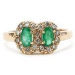 Unmarked gold emerald and diamond Toi et Moi ring, each emerald approximately 5.10mm x 3.10mm x 2.