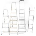 Four aluminium ladders including Youngman Spacemaker loft ladder and two Beldray stepladders, the