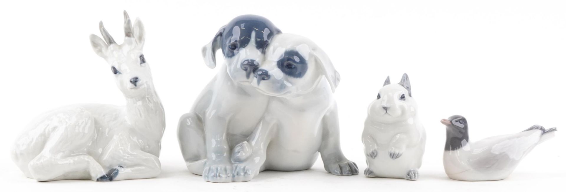 Royal Copenhagen, Danish porcelain animals including Pointer Puppies by Erik Nielsen, Fawn by Karl