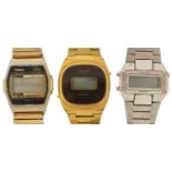 Three vintage gentlemen's digital quartz wristwatches including Timex and Tissot, the largest 36mm